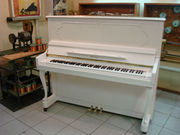 Пианино с двухрепетиционной (рояльной) механикой